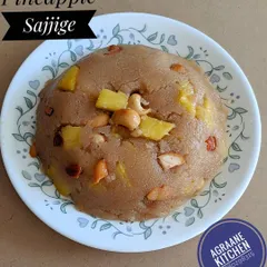 My special Pineapple Sajjige, also known as Kesari Bath. This sweet semolina dish is rich with ghee, cashews, and chunks of fresh pineapple for a tangy twist.