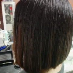 A back view of a perfectly executed bob haircut. Notice the clean lines and the healthy shine of the hair.