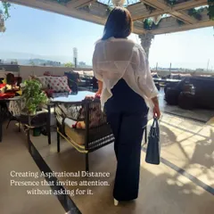 I teach my clients the art of 'Aspirational Distance', a concept where presence invites attention without asking for it. It's about quiet luxury and confidence worn softly.
