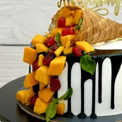 A close-up of my viral mango and chocolate gravity-defying cake. It's a feast for the eyes and the taste buds.