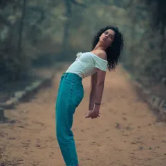 The same pose, but with a direct look at the camera. This changes the feeling from pensive to powerful, showing how a small shift can make a big impact.