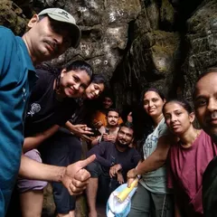 A happy group selfie inside one of the dark Ulavi caves. Exploring these natural formations together is a great bonding experience.