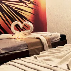 Our couples massage room is a private sanctuary designed for shared relaxation. It's the perfect setting to reconnect with a loved one while our therapists work to melt away your stress in a serene, candlelit ambiance.