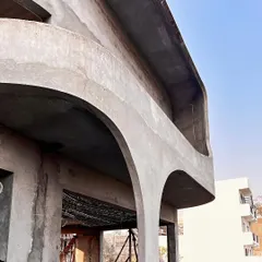 The soft, flowing curves of the "La La Land" facade begin to take shape. We reimagined a traditional facade as a symphony of gentle bends and smooth forms.