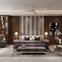 This expansive master bedroom features a dedicated reading corner with wingback chairs and a full-height bookshelf. The design uses a sophisticated palette of grays and rich woods to create a restful yet functional retreat.
