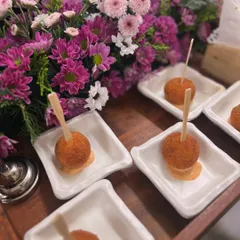 Our Mushroom and Truffle Arancini are a crowd favorite. These crispy, golden-fried risotto balls are filled with earthy mushrooms and served on a bed of our house-made spicy mayo for the perfect bite.