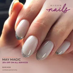 For a touch of glamour, I added a silver glitter French tip to this milky white base. It’s a modern and festive twist on the classic French manicure.