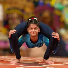 Age is just a number. I train young champions to achieve incredible feats of flexibility and strength, like this flawless backbend, proving that dedication starts early.