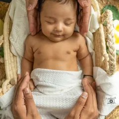 A tiny, peaceful smile in their sleep. I gently pose your baby in cozy baskets and wraps, focusing on their delicate features and serene expressions while they dream.