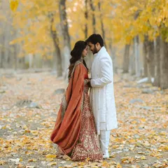 A couple shares a quiet moment in a forest of golden autumn leaves in Himachal. This image highlights my ability to use stunning natural landscapes to create epic and romantic pre-wedding portraits.