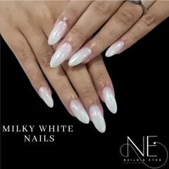 This is our popular milky white finish. It provides a clean, semi-translucent look that is incredibly chic and versatile, shown here on long almond-shaped nails.