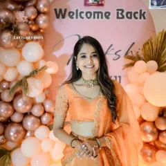 The guest of honor looking radiant at her welcome back celebration.