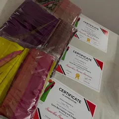 A proud moment, awarding certificates to my students. Their beautifully folded sarees are a testament to their hard work during the workshop.