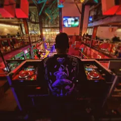 A view from my console at Loft38. I love the multi-level setup of this venue, which allows me to connect with the crowd on every floor and create a massive, unified party atmosphere.
