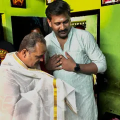A moment of respect and gratitude as we honor our Guru during the 'Guruvandanam' ceremony.