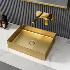 A washbasin should be a statement piece. I provide a range of designer basins like this rectangular countertop model in a brushed gold finish. Paired with a wall-mounted faucet, it creates an ultra-modern and luxurious look for any bathroom or powder room.