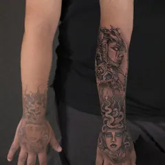 Sometimes you don't need to cover, you need to continue. I extended this client's existing Medusa hand tattoo up the forearm, blending the new art to complete the story.