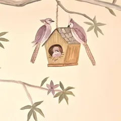 A sweet family of birds in their birdhouse, another detail from the whimsical woodland mural. These small touches are what make a room feel truly special and personal.