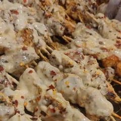 For the cheese lovers, my Malai Cheese Sticks are a must-try. These chicken skewers are grilled and then generously topped with a creamy cheese sauce and a sprinkle of chilli flakes for a little kick.