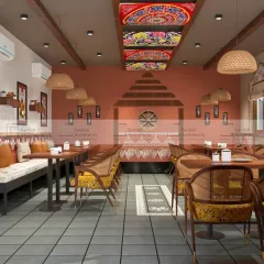This cafe design is inspired by the rich culture of Odisha. We used traditional Pattachitra art on the ceiling, rustic terracotta colors, and cane furniture to create a cozy and culturally immersive dining experience.