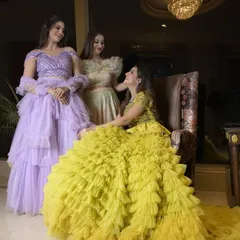 Another shot of the vibrant ruffle gowns, perfect for creating a colorful and dramatic statement in your photos.