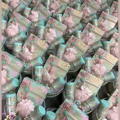 A stunning display of our pastel-themed wedding favors, ready for a grand celebration. These round tray hampers are filled with curated goodies, showcasing our ability to handle large, coordinated orders with impeccable style.