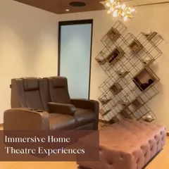 Our showroom features multiple setups, including this immersive home theater space with comfortable seating. It's the perfect place to experience the difference high-quality integration makes.