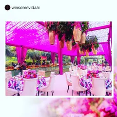 For this vibrant Mehendi celebration, we worked with the decor team to create a beautiful setting with bright pink drapes and floral arrangements. Our buffet setup seamlessly integrates into the overall design.
