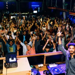 A sea of hands in the air at Cafe Mambo. This is the moment every DJ and producer works for. It's a clear sign that the music is connecting and the energy is at its peak.