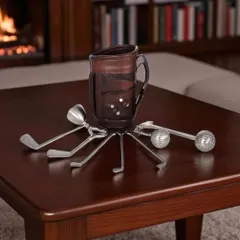 A unique and playful gift for a golf enthusiast. This miniature golf bag holds a complete set of bar tools cleverly designed as golf clubs, perfect for a home bar or office desk.