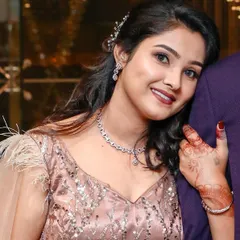 A lovely candid shot of Annie after her makeup session. This shows how the makeup looks soft and beautiful in professional photos, perfect for capturing memories of your special day.