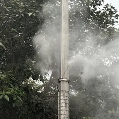 This is a close-up of the misting nozzle, the core of my air cleaning technology. These nozzles are mounted on existing electric poles, making installation quick and non-disruptive. They release a fine, targeted mist of treated water to improve local air quality.