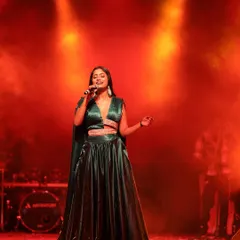 The outfit commands the stage. It’s designed to be comfortable for a performer while looking absolutely glamorous.