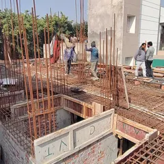 On-site at an upcoming residential project during the slab casting phase. This image shows the intricate network of steel rebar being laid, a critical step in ensuring the structural integrity of the building's foundation and floors.