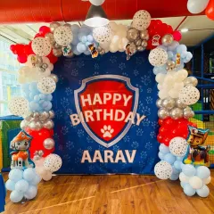 This Paw Patrol entrance arch welcomes guests right into the party's theme. I used red, blue, and silver balloons and placed character cutouts at the base.