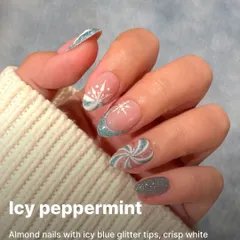 An icy peppermint theme perfect for the winter season, with blue glitter tips, crisp white snowflakes, and frosted swirl details.