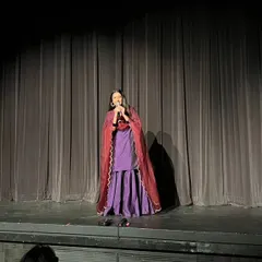 The stage is a space where I can act as the 'sootradhar', the thread-holder, weaving stories together to connect with the hearts of the audience. Here, I was hosting and narrating a theatrical show, a role that reminds me of the importance of every part in creating a beautiful whole.