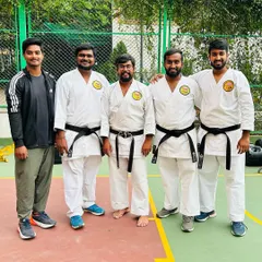 A group of my senior black belt students and instructors. Their journey is a testament to the principle that discipline leads to habits, consistency, and finally, growth.