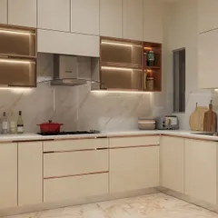 Here you can see the seamless L-shaped layout of the high-gloss kitchen. The design integrates the sink and cooking areas efficiently, providing ample counter space and maintaining a clean, uncluttered look.