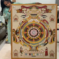 A moment of connection with the finished "Siddha Chakra." People often see the final piece but overlook the deep, meditative journey behind its creation.