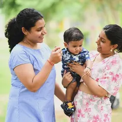 A sweet, candid moment between family members and the birthday boy during an outdoor photoshoot. These are the warm, loving memories you'll cherish forever.