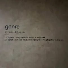 The definition of 'genre' on the wall says it all. It's about a set of emotions, flavors, and people coming together in a space, which is what I strive for.