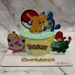 Gotta catch 'em all! This Pokémon-themed cake brings the world of Pikachu, Squirtle, and Bulbasaur to the party, complete with a Poké Ball and personalized name.