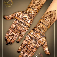 A unique design with small, story-telling blocks containing various motifs like elephants, paisleys, and flowers.