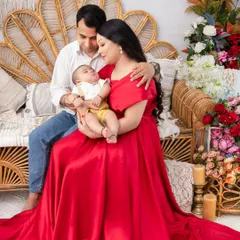 A new family of three. This portrait captures the overwhelming love and tenderness that comes with welcoming a new baby.