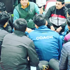 Our head coach discussing strategy and providing motivation to the coaching team. We believe in constant learning and improvement.