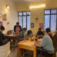 A view of our ear sculpting workshop in session. Participants are focused on their clay, learning the intricacies of human anatomy under the guidance of artist Indu Antony in our cozy studio.