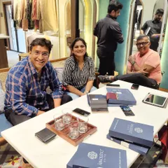 A happy group during a consultation. We love involving family in the process to ensure the final garment is something everyone is excited about.