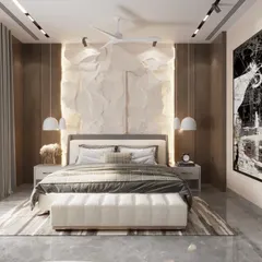 This luxury bedroom is a study in texture and light. A unique, crumpled-paper-effect feature wall is backlit to create a soft glow, while a large abstract artwork adds a bold, modern statement. The result is a classy and artistic personal space.