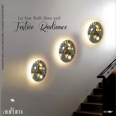 This trio of backlit, patterned wall sconces adds festive magic to a staircase. It's a perfect way to make every part of the home feel celebratory and bright.